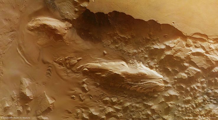 Mars' "Juventae Chasma (11337951926)" by European Space Agency - Juventae Chasma. Licensed under CC BY-SA 3.0-igo via Wikimedia Commons – link here